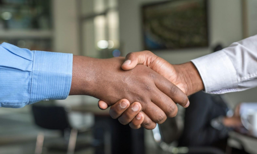 Two people shaking hands