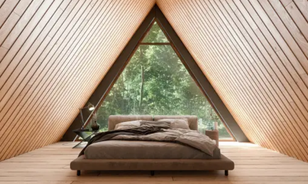 Bedroom with bed and window, natural light illuminating the room