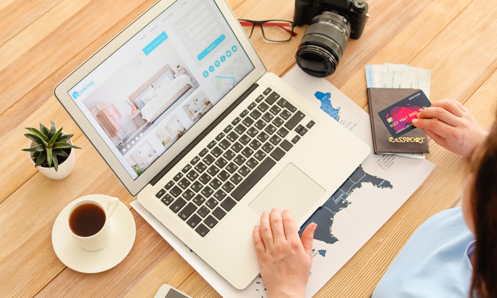 a traveler booking her travel through a travel booking system